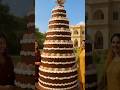 Two Punjabi women making largest cake with chocolate flewer flavor || #shortsfeed #trending #shorts