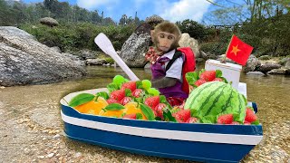 Farmer Bim Bim rowes a boat to pick fruit for Amee