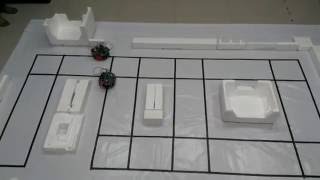 IMRDFS Exploration and Mapping Strategy using Two Mobile Robots on a Graph