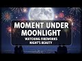 الوصف: لحظة تحت ضوء القمر | مشاهدة الألعاب النارية