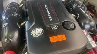 Interesting gas strut system for boat engine hatch.