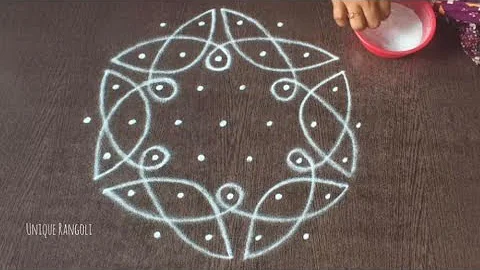 Unique Rangoli design with 7×4 interlaced dots|Creative sikku kolam with 7 dots|7 Dots kolam|Muggulu
