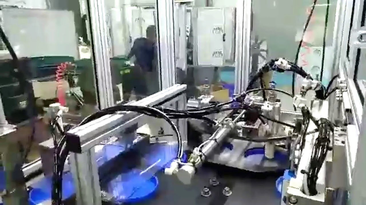 two heads caps lifting feeding wads inserting wadding liner equipment tested for Canadian customer