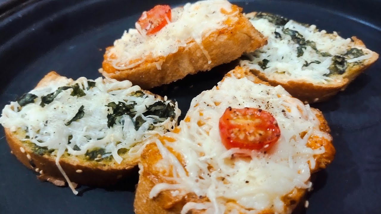 Garlic bread pesto and cherry tomato Garlic bread cheesy and toasty