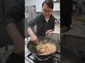 Stir-Frying Savory Flat Noodles with Seafood and Veggies