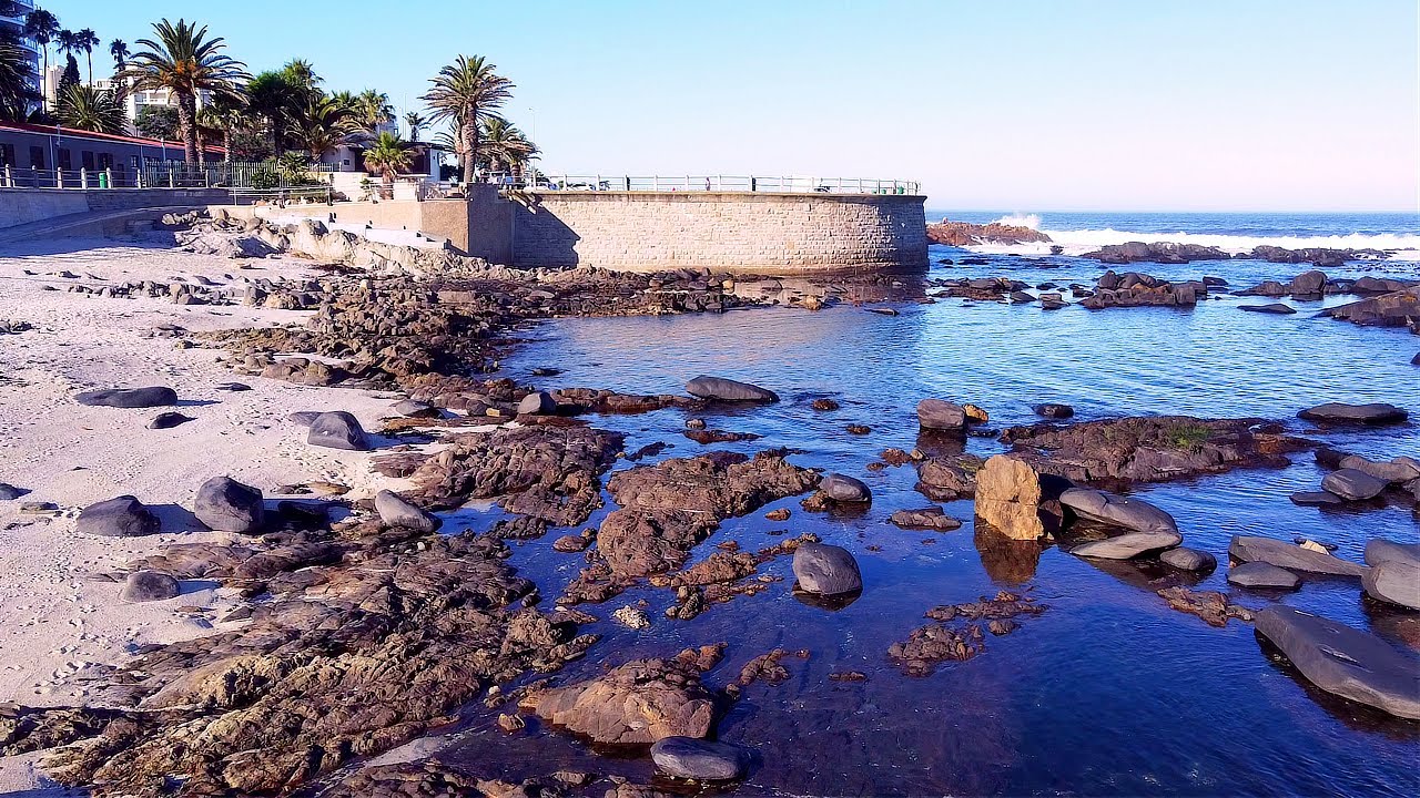 4K drone aerial low-level flyover of Saunders' Rocks Beach in Bantry Bay