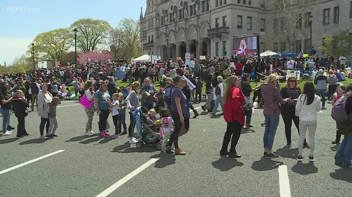 Thousands of parents and children rally at the State Capitol against the vaccine exemption bill