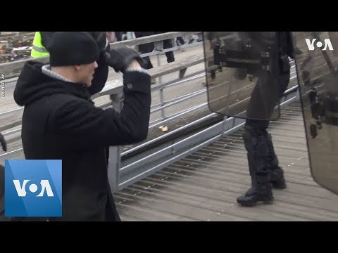 Protester 'Boxes' with Police at Paris Demonstration