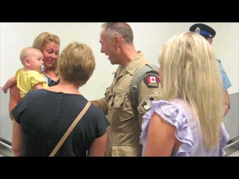 Toronto Police Officers Return from Afghanistan Au...