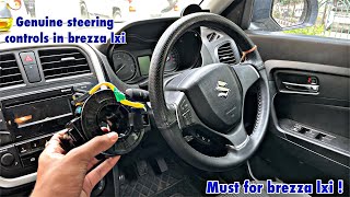 Installed steering mounting controls in brezza lxi | Genuine steering controls in brezza lxi