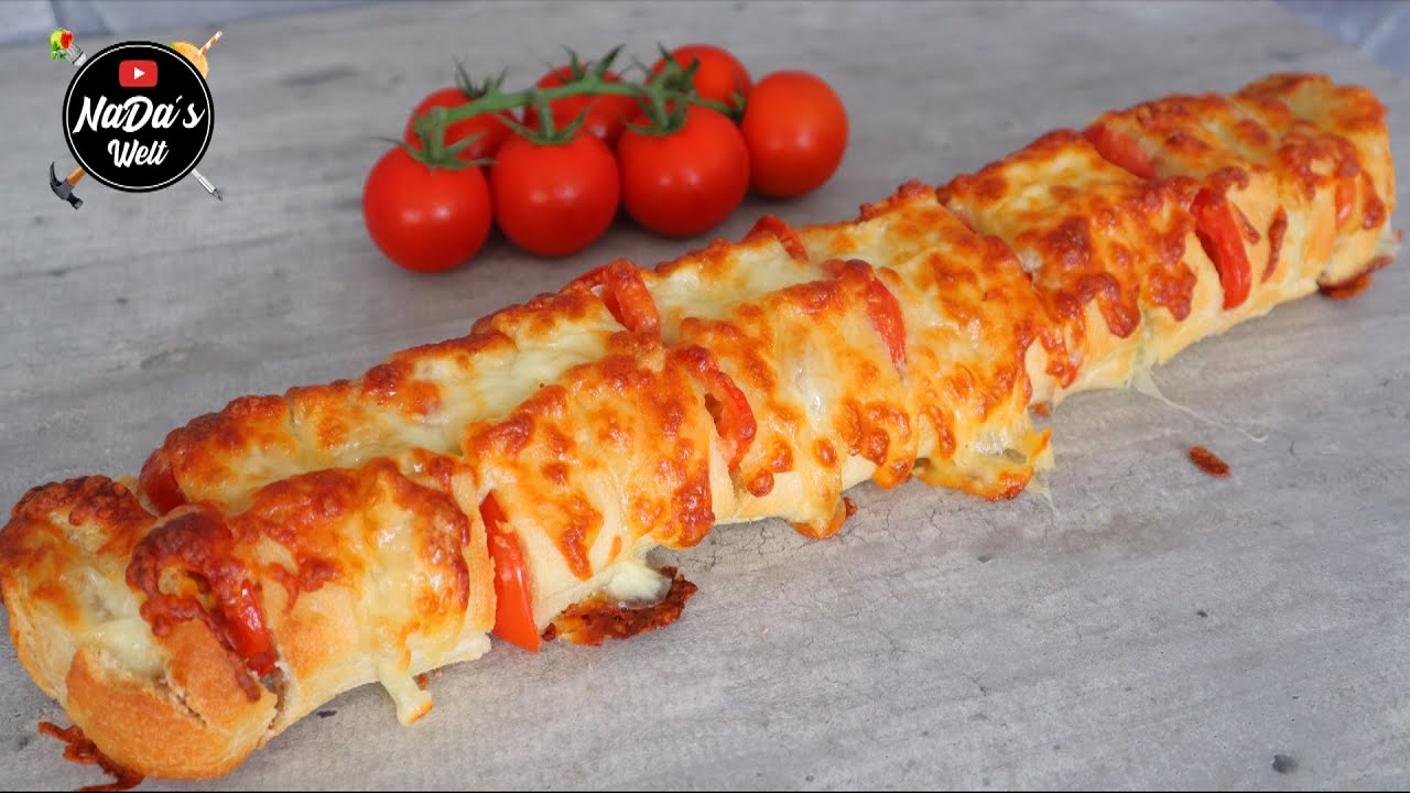 Gefüllte Ciabatta mit Tomaten und Mozzarella / überbacken mit Käse ...