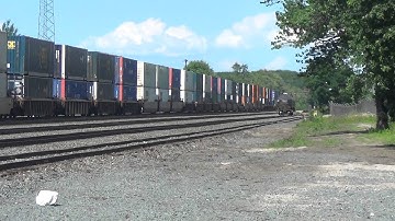 Canadian National Engine Leads Huge  CSX Double Stack Train Westbound