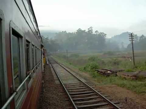 Sri Lanka Railways - Badulla bound Night-mail train passing Colombo bound "Udarata Manike" express train at Heel-Oya Railway Station.