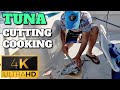 Tuna cutting  cooking on a fishing boat  tenerife  spain  4k  2024