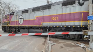 Kingston bound commuter rail train at the Pond Street crossing. South Weymouth, MA