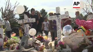 Batman star Christian Bale visits memorial to those who died in theatre shooting