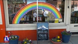 Sugarhouse businesses paint colorful signs in their windows
