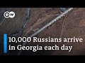 How many Russians flee the country to avoid Ukraine call-up? | DW News