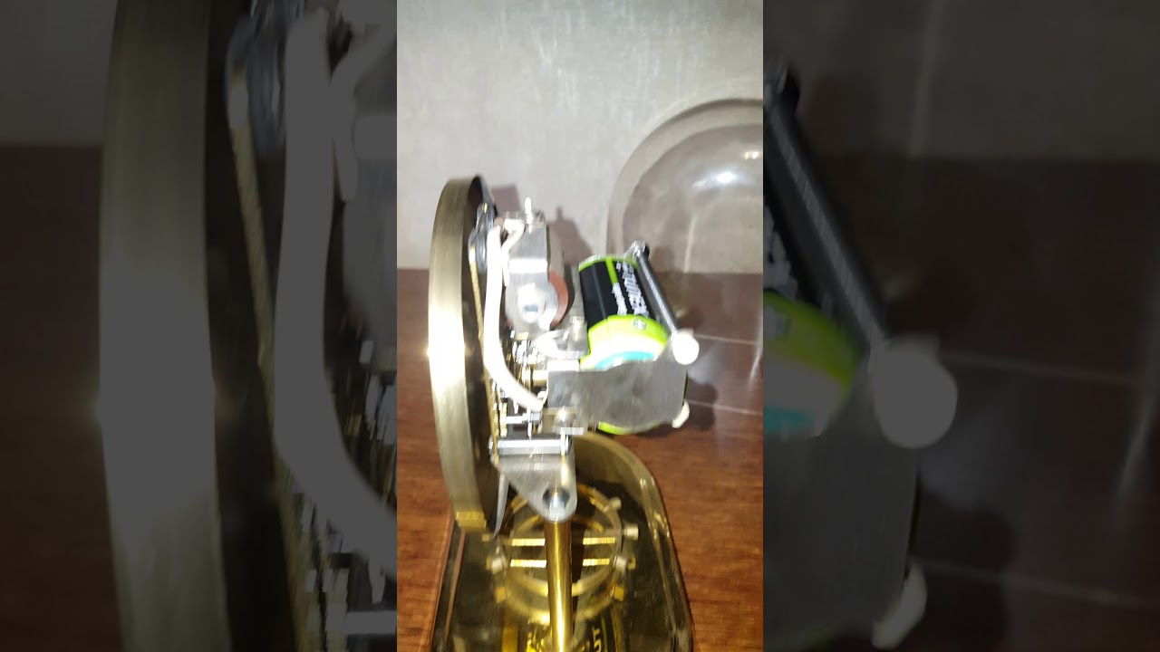 Hettich electric weight driven clock