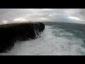 Huge wave breaks over lighthouse Eshaness, Shetland