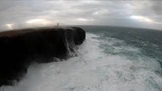 Huge wave breaks over lighthouse Eshaness, Shetland