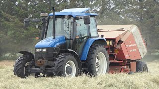 New Holland TS90 in the field baling roundbales w/ Welger RP200 Round Baler | DK Agri