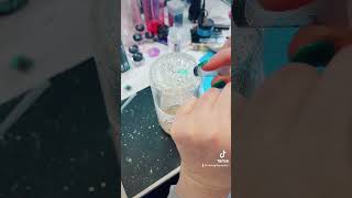 Removing air bubbles from snowglobe tumblers