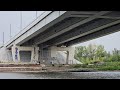 Под Фрунзенским мостом закрашивают вандальные граффити