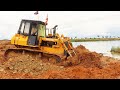 Great Activity Bulldozer Heavy Equipment Pushing Dirt and Dump Truck Unloading Dirt