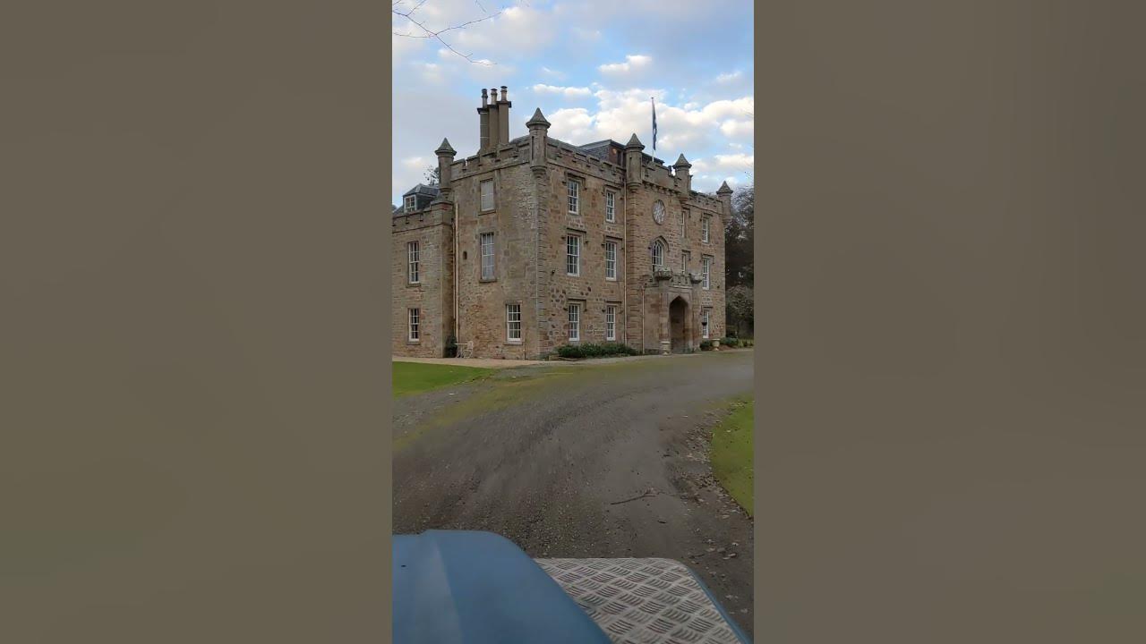 Land Rover arriving at a Scottish Highland castle - Music Professor Elemental
