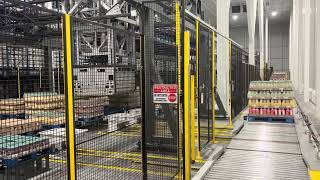 Multi Axis Cartesian Gantry 1000’s SKUs stacked, buffered, built and conveyed.  Servo Siemens PLC