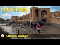 Isfahan iran 2021  walking on khajoo bridge on a rainy autumn day        