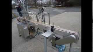 JG Machine Works Twelve Spout Automatic Pressure Gravity Filler | Wohl Associates