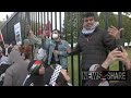 Pro-Palestine demonstrators wave flags through, protest at White House fence