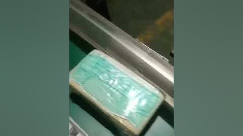 Face mask cartoning machine