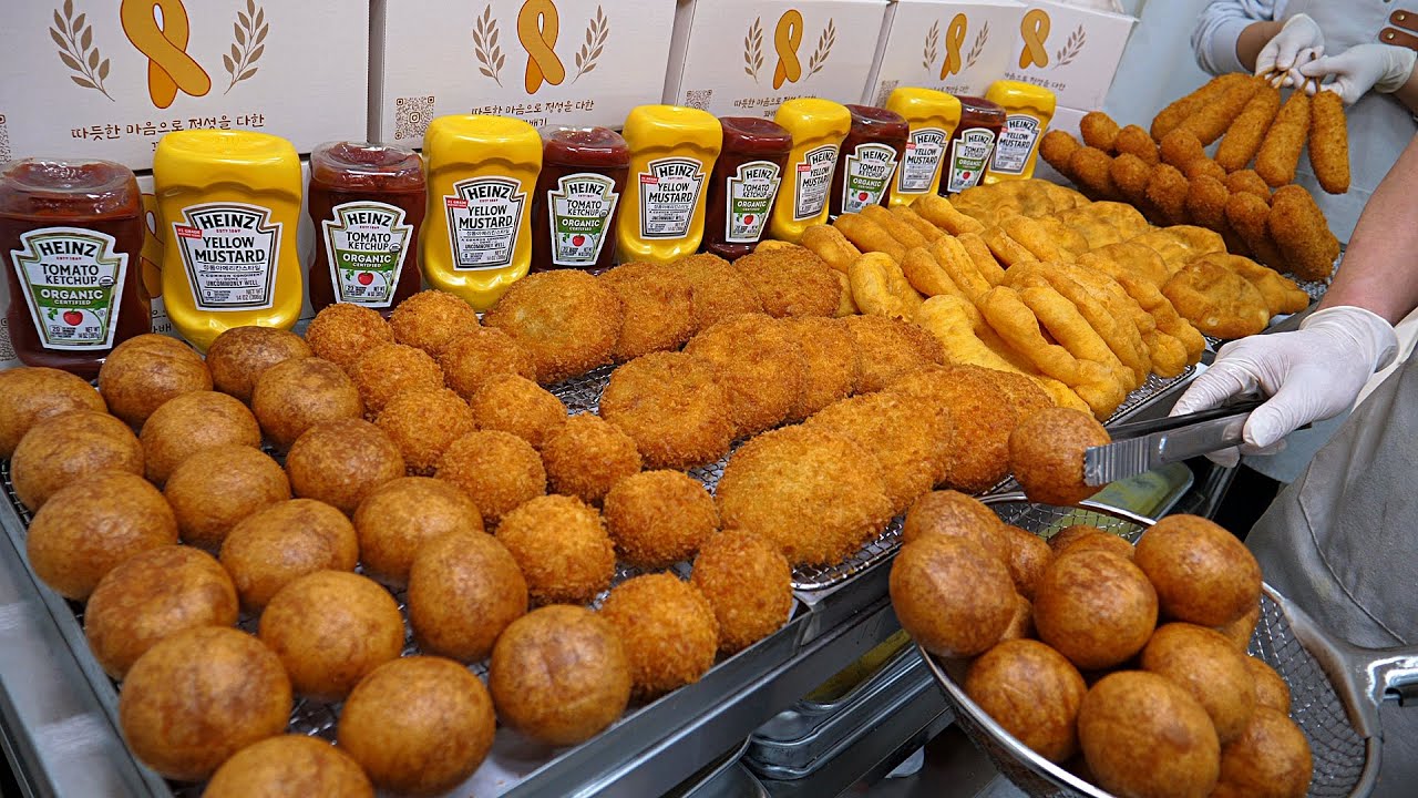 Прекрасная владелица, добившаяся успеха благодаря своим пончикам. / Корейская уличная еда