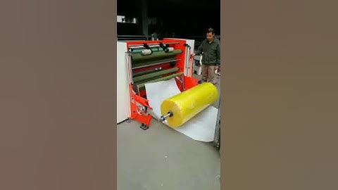 Auto lifter /Auto loader - Gum tape slitting machine.