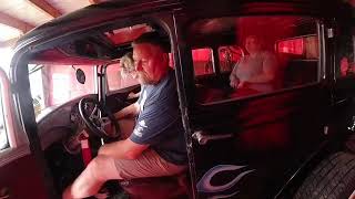 Todamakader and family and a 1932 Studebaker Rockne