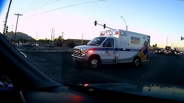 Medic West Running Code 3 thru Intersection