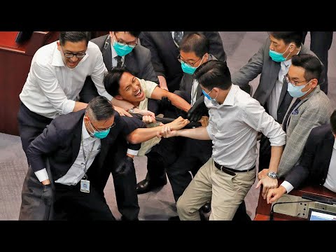 Scuffles break out between Hong Kong lawmakers as pro-China camp elects chair