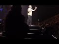 ROBBIE WILLIAMS - (talking 2 girls in chairs front of stage) Royal Arena, Copenhagen [Feb 27, 2023]