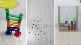 ASMR Video with jingle bells, beads, balls, wooden toys, marble run and other