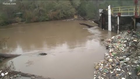 Flooding sends trash floating downstream in Rockdale County