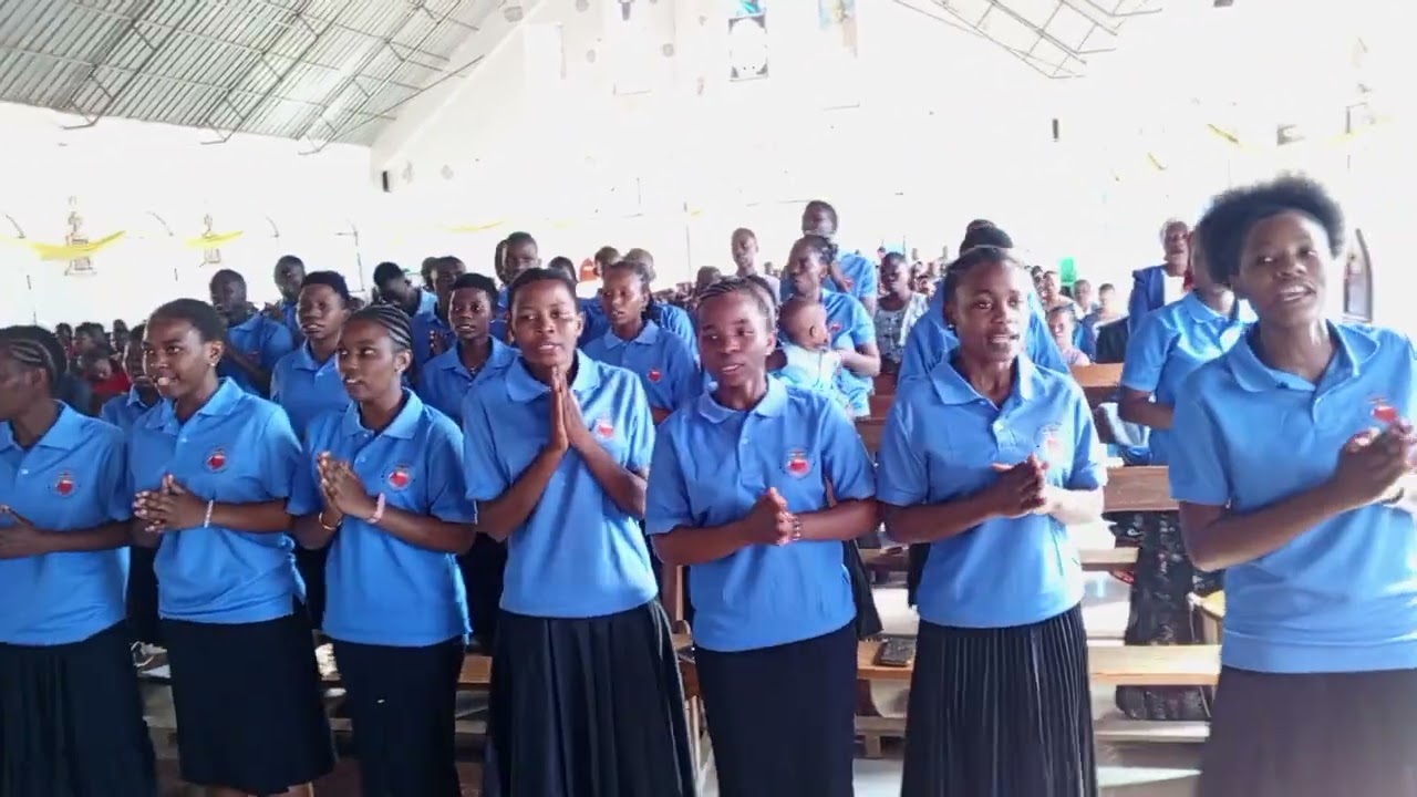 MALAIKA MTAKATIFU BY E.F.KIDALUSO IKIIMBWA NA KWAYA YA MOYO MTAKATIFU WA YESU CHUO CHA CBE-MWANZA.