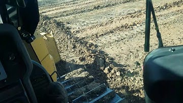 Trying to finish grade a building pad with D6K2 & trimble 2D laser system.(Video #2)