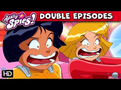TOTALLY SPIES! - A VILLAIN IS MAKING ALL OF THE ADULTS IN THE WORLD ACT AS CHILDREN USING EVIL TECHNOLOGY DISGUISED AS OLD-FASHIONED TOYS! / THE GIRLS ARE CALLED IN WHEN STRANGE BLOB SHAPED CREATURES DRAIN THE KNOWLEDGE AND MEMORIES OUT OF A CONSORTIUM OF
