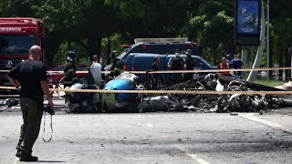 At least two dead after plane crashes into vehicles on busy road in Brazil