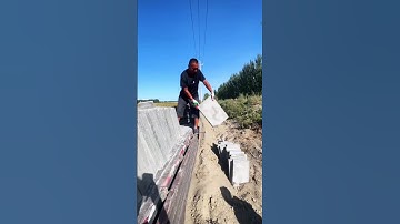 Workers’ Skillful Technique for Cement Slab Unloading