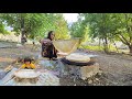 Nomadic life in Iran: Baking local bread on fire by nomadic women
