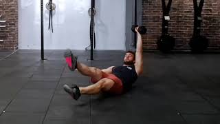 Single arm dumbbell hollow body flutter kicks